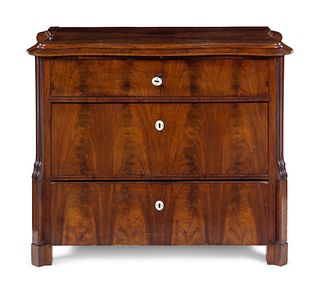 A Continental Mahogany Veneered Chest of Drawers