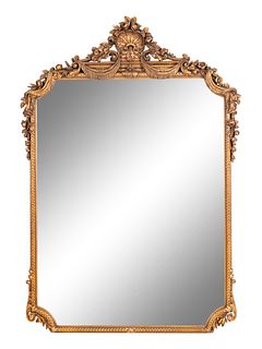 A Neoclassical Carved Giltwood Mirror
