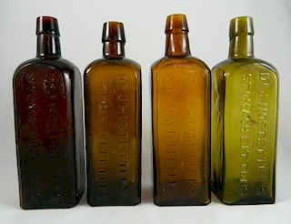 4 Dr. Hostetter's bitters bottles