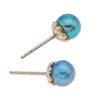 Par de broqueles con perlas en plata paladio. 2 perlas cultivadas en color azul de 6 mm. Peso: 1.6 g.