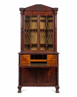 A Regency Carved and Figured Mahogany Secretary Bookcase