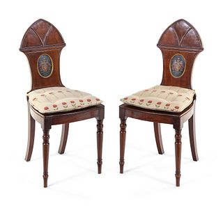 A Pair of Regency Style Mahogany Hall Chairs