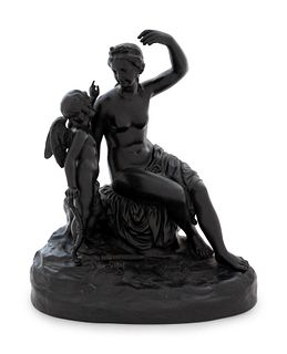 A Wedgwood Black Basalt Figural Group Depicting Cupid Disarmed