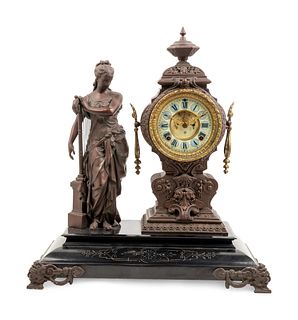 An Ansonia Music Patinated-Metal Mantel Clock