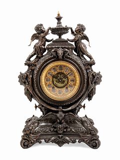 An Ansonia Lydia Patinated-Metal Figural Mantel Clock