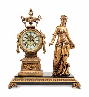 An Ansonia Commerce Gilt-Metal Figural Mantel Clock