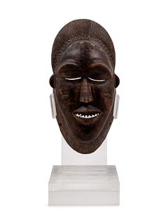 A Baule Style Carved Wood Mask