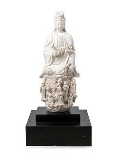 A Chinese White Glazed Porcelain Figure of Guanyin