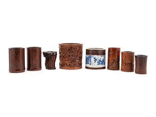A Group of Chinese Hardwood and Porcelain Brush Pots