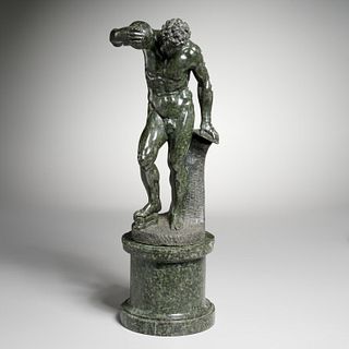Carved serpentine sculpture, "Faun with Clappers"