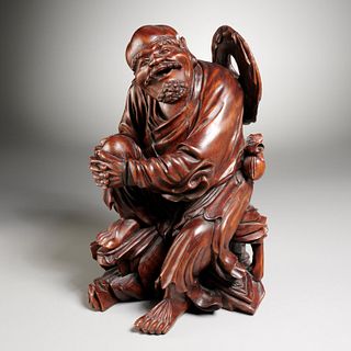 Chinese carved hardwood figure of seated Luohan