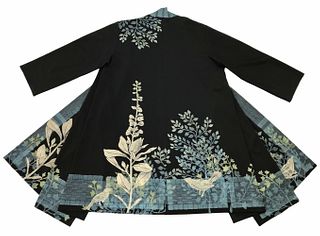 Black coat with plants, birds and a turquoise border design.