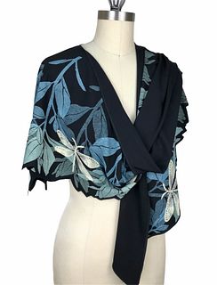 Black, turquoise and green wrap with plants and dragonfly's.