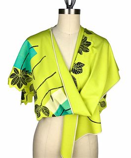 Bright green wrap with leaves and rectanlgles.