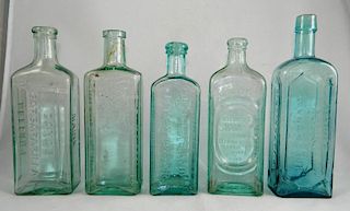 Medicine - 5 aqua rectangular bottles