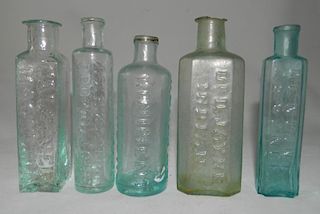 5 Aqua medicine bottles