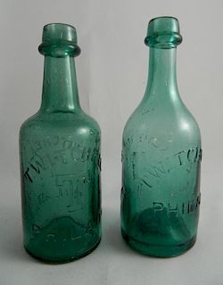 2 Soda medium emrald green bottles