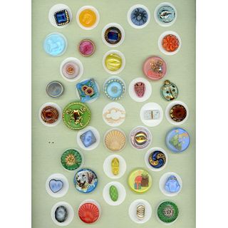One Card Of Small/Medium Moonglow Glass Buttons