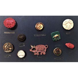 A Small Card Of Pigs In Assorted Materials