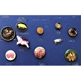 A Small Card Of Pigs In Assorted Materials