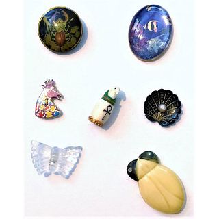Small Card Of Assorted Material And Animal Buttons