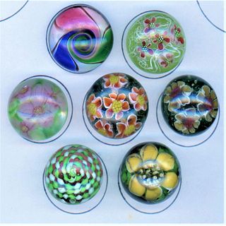 A Small Card Of Assorted Glass Paperweight Buttons
