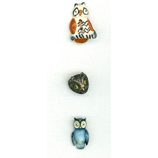 A Small Card Of Owl Buttons In Assorted Materials