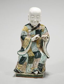 Chinese Enameled Porcelain Figure of a Monk