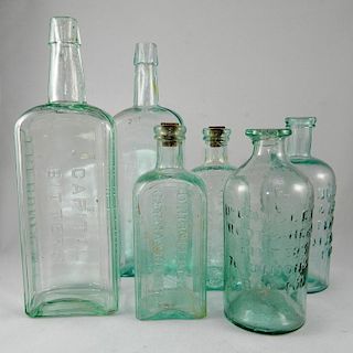 6 aqua Bitters bottles