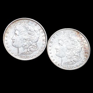 An 1885 and 1886 $1 Morgan Silver Dollar Coins