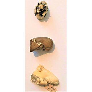 A Small Card Of Natural Material Netsuke'S