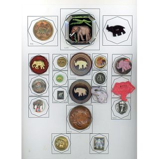 A Full Card Of Assorted Material Elephant Buttons