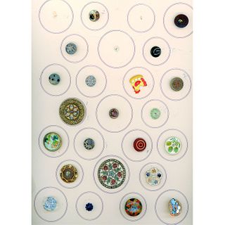A Card Of Assorted Material Buttons