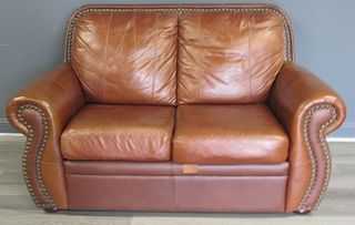 Vintage And Quality Leather Settee.