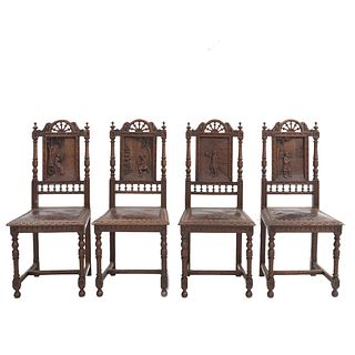 Lote de 4 sillas. Francia. Siglo XX. Estilo Bretón. En talla de madera de roble. Con respaldos semiabiertos y asientos tipo piel.