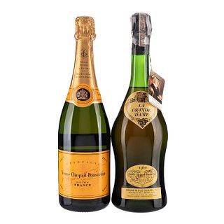 Champagne. a) La Grande Dame. Cosecha 1962. b) Veuve Clicquot. Brut. Total de piezas: 2.