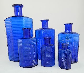 Poison 6 cobalt irregular horizontal bottles