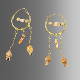 A pair of Islamic Gold Earrings with banded agate beads. 