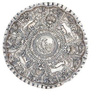 Tray, Mexico (?), 19th century, Silver, Embossed and chiseled tray with central image of bird, surrounded by zoomorphic figures