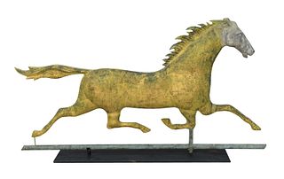 Running Horse Weathervane having zinc head, mane and tail flowing mostly gilt with some verdigris surface.
height 17 1/2 inches, len...