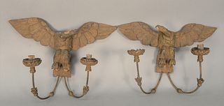 Pair Sconces with gilt eagle backs and two candle holder arms, carved wood and gesso, 19th century, (paint chips, one tole bobache missing).
height 13