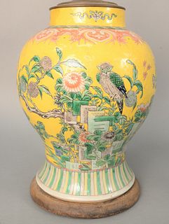 Chinese Porcelain Famille Rose Vase, yellow ground with painted blossoming tree and perched birds (repaired). height 13 1/4 inches, ...