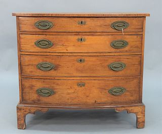 Chippendale Cherry Bow Front Chest with four drawers set on cut out bracket feet, circa 1780.
height 31 inches, width 33 1/4 inches, depth 20 1/2 inch