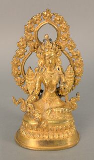 Chinese Gilt Bronze Seated Tara, seated figure on lotus form base.
height 7 inches.