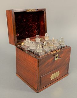 Mahogany Medical Apothecary Box, opening to fitted interior having twelve bottles over drawer opening to fitted interior with scale,...