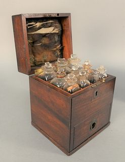 Mahogany Medical Apothecary Box, comprising of fitted interior with seven bottles and a beaker, drawer opening to scale, mortar and ...