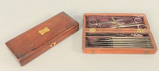 Two Field Surgical Kits, Sheffield and Edinburgh, each having fitted interior with scalpels, scissors and tweezers.
length: 7 1/2" e...