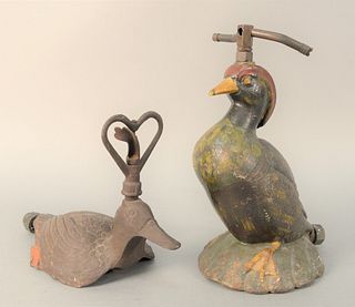 Two Cast Iron Lawn Sprinklers, wood duck with original paint along with a seated mallard duck with original paint.
height 8 1/2 inches. 
Provenance: T