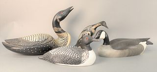 Four Carved Decoys, two decorative Loons, a Chet Reneson with original paint; Canadian Goose hollow carved raised V tail wing signed and dated 11/23/9