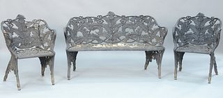 Three Piece Cast Iron Garden Set, fern pattern to include a garden bench and two arm chairs, one chair as is.
length of bench: 55 inches.
Provenance: 
